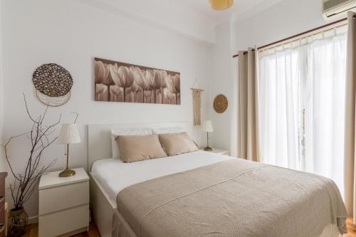 Cozy Apartment with Private Courtyard , Near Syngrou-Fix Metro Station