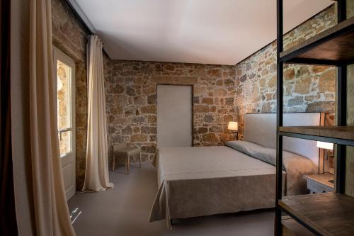 Ένα ή περισσότερα κρεβάτια σε δωμάτιο στο Villa Morisca