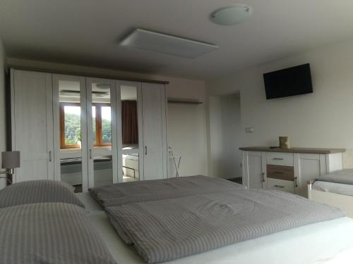 Postel nebo postele na pokoji v ubytování Apartmány 27
