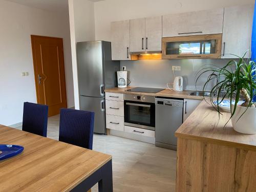 Kuchyň nebo kuchyňský kout v ubytování Apartment Marisol Barbat