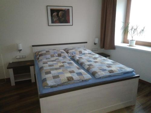 Postel nebo postele na pokoji v ubytování Apartmány 27
