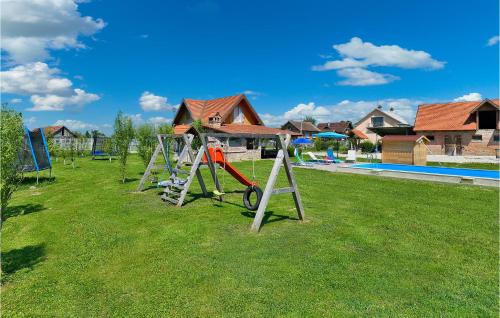 Detský kútik v ubytovaní Two-Bedroom Holiday Home In Poljana