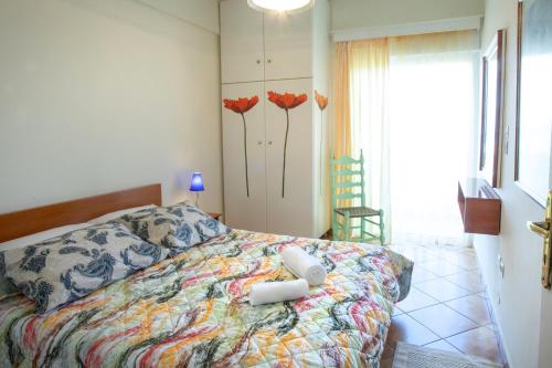 Ένα ή περισσότερα κρεβάτια σε δωμάτιο στο Yukas Home Xylokastro for 3 persons by MPS num 3