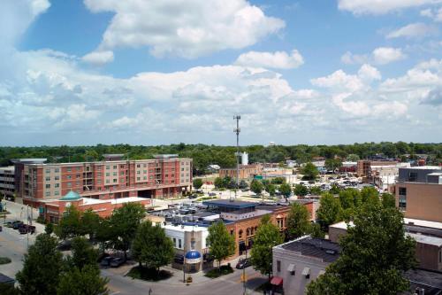 an aerial view of a city with buildings and trees at Marriott Bloomington Normal Hotel and Conference Center in Bloomington