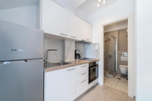 Kuchyň nebo kuchyňský kout v ubytování Kleoniki & Irida Residential Complexes