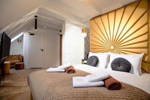 Ένα ή περισσότερα κρεβάτια σε δωμάτιο στο Amber Park Spa