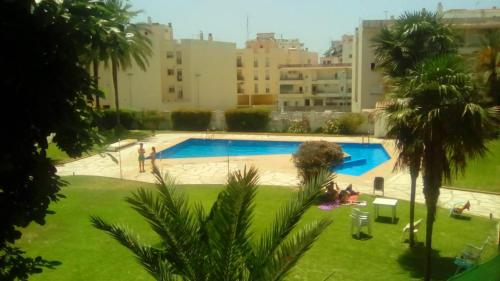 Luminoso apartamento Playa Torrecilla. Con Piscina