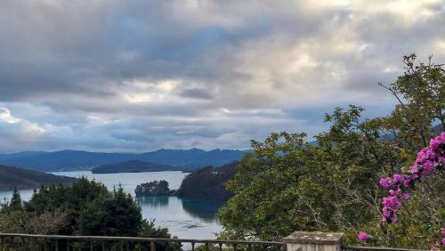 a view of a lake on a cloudy day at Apartamento La Ilusión - Cariño in Cariño