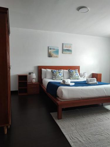 מיטה או מיטות בחדר ב-CarreraHouses Campito