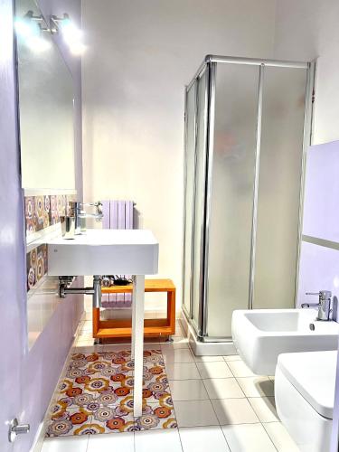a bathroom with a sink and a shower at Casa Vacanza Saint Patrick DImora del 1200 in Barletta