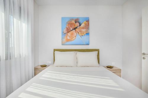 Ένα ή περισσότερα κρεβάτια σε δωμάτιο στο Epta Villas Luxury Redefined