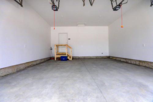 a large room with white walls and a concrete floor at GLOBALSTAY New houses near Huron Lake in Port Elgin