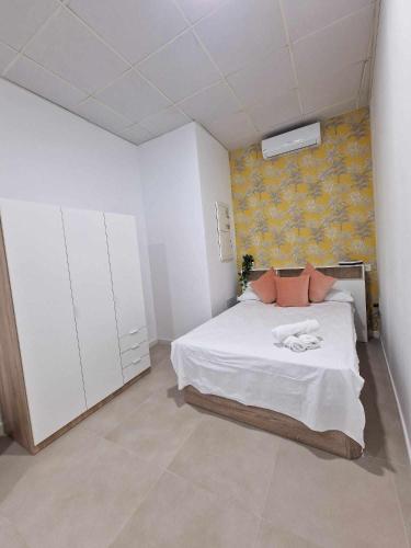 Posteľ alebo postele v izbe v ubytovaní Moderno apartamento 4 en Calle Mármoles