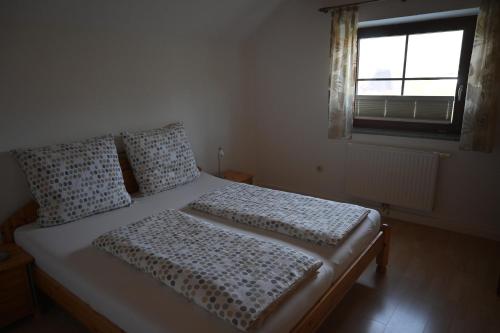 Postel nebo postele na pokoji v ubytování Ferienhaus Humer