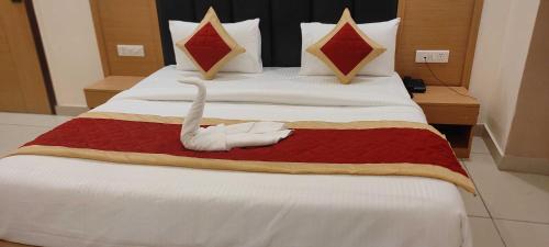 Uma cama ou camas num quarto em Capital O Del Inn