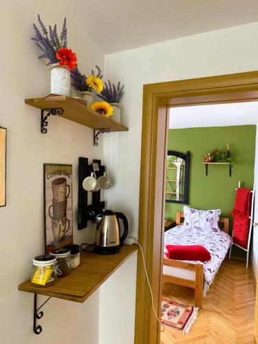 Llit o llits en una habitació de Apartman Ohren