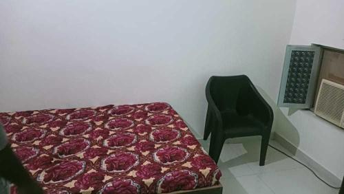 Ein Bett oder Betten in einem Zimmer der Unterkunft SPOT ON Hotel G&s Residency
