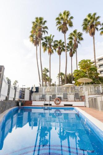 Бассейн в Apartamentos Oasis Sol или поблизости