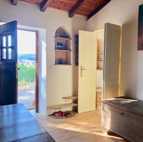 Casa Anneli - relaxing under the olive tree