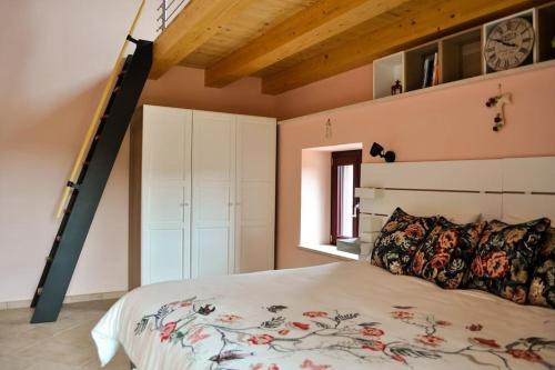 Säng eller sängar i ett rum på Casolare Brindavan: un paradiso nei Monti Sabini