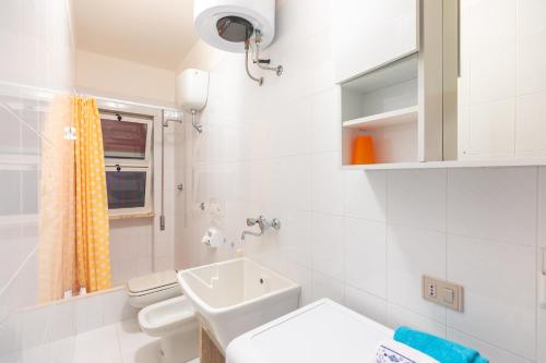 Ванна кімната в Appartamento Orchidea B2 - MyHo Casa