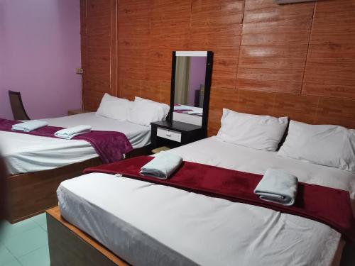 Postel nebo postele na pokoji v ubytování Bussaracum Resort
