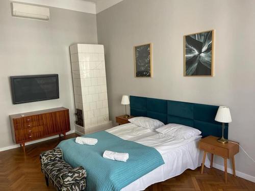 Posteľ alebo postele v izbe v ubytovaní Floriańska Grand Apartment 2