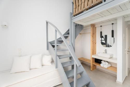 Postel nebo postele na pokoji v ubytování Petradi Beach Lounge Hotel