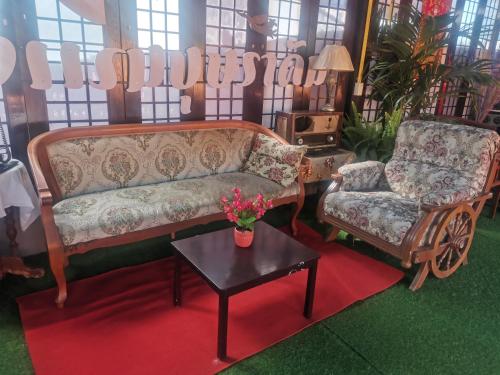 Posezení v ubytování Bussaracum Resort