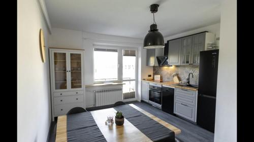 Kuchyň nebo kuchyňský kout v ubytování MARCEL APARTMENT
