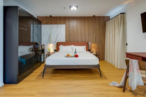 Postel nebo postele na pokoji v ubytování RoccaRegina Hotel