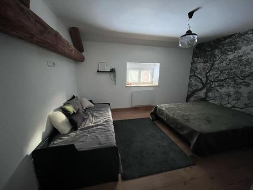 Postel nebo postele na pokoji v ubytování Gîte Chantoiseaux