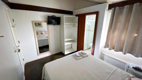 Letto o letti in una camera di Pousada Noantri