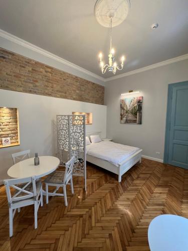 Postel nebo postele na pokoji v ubytování VISAJ Deluxe Downtown