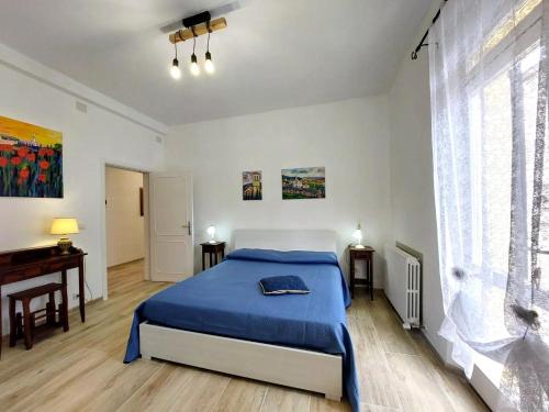 Ліжко або ліжка в номері Appartamento vacanze Via Blum