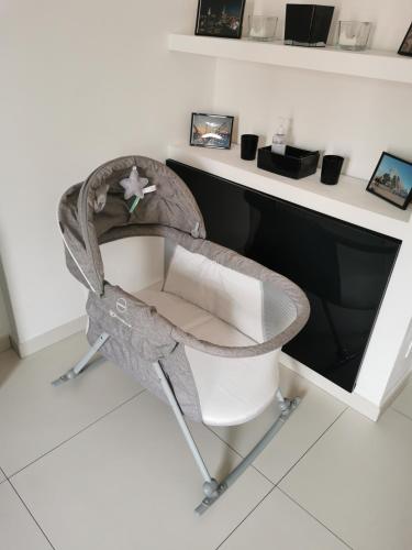 a chair in front of a desk in a room at Principato di Baragallo - Free Private Parking in Sanremo