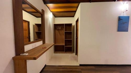 a hallway with a vanity and a walk in closet at RISING SUN BEACH VIEW in Thinadhoo