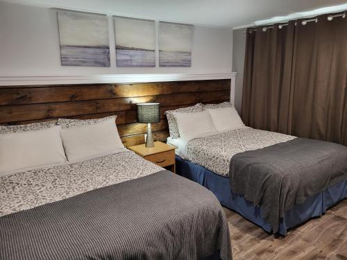 Postel nebo postele na pokoji v ubytování Scoodic Motel