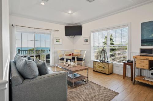 a living room with a couch and a table at The Cliffside Resort Condominiums in Greenport