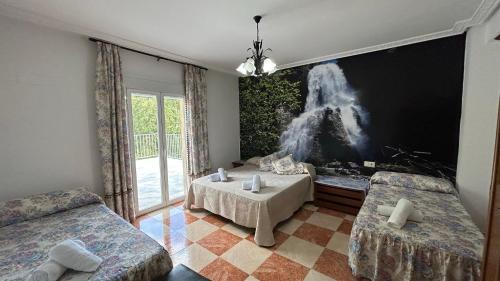 Postel nebo postele na pokoji v ubytování Vivienda rural Saltos de la Osera