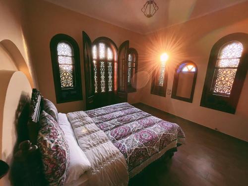 Postel nebo postele na pokoji v ubytování Tunis castle