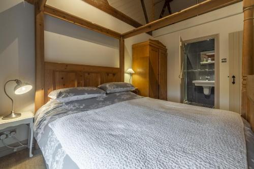 Postel nebo postele na pokoji v ubytování Great Barn