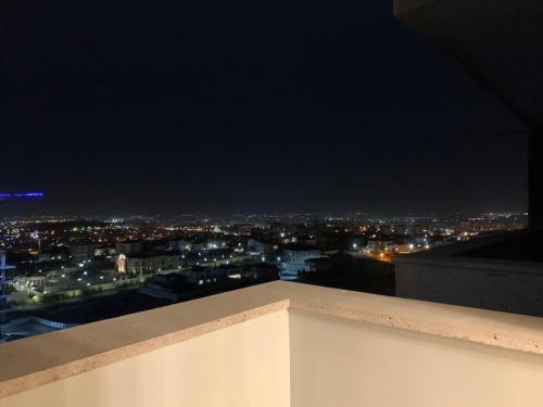 a view of a city at night from a building at Luxury Apartment with balcony in Yerevan