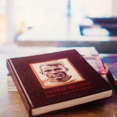 a book with a picture of a man on the cover at Cytyz Appart Hôtel in Mahajanga