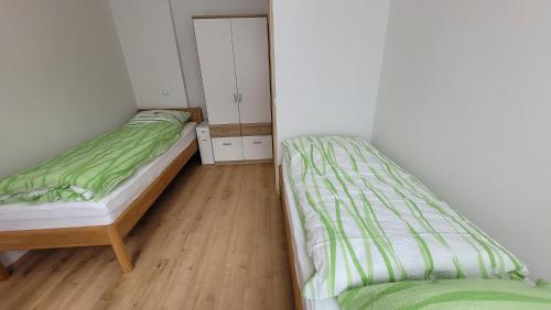 Postel nebo postele na pokoji v ubytování Sachsentraum - Nähe Göltzschtalbrücke