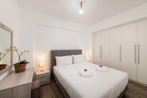 Postel nebo postele na pokoji v ubytování E.Berdufi Apartament Sea View