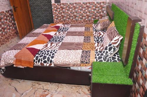 Katil atau katil-katil dalam bilik di Hotel O Grand