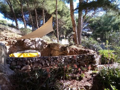a tent set up in a stone wall at villa rahuette in Sète
