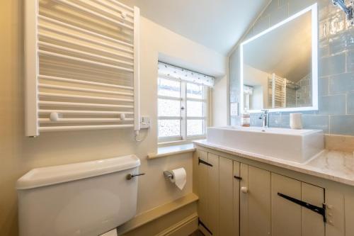 Et badeværelse på Arch Cottage