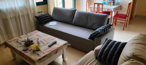 Posezení v ubytování Acogedor Apartamento